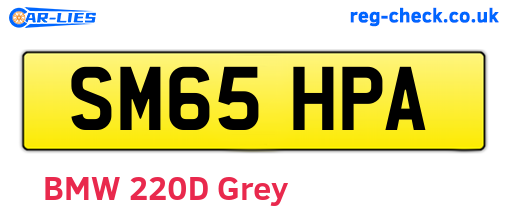 SM65HPA are the vehicle registration plates.