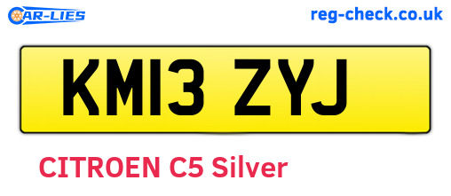KM13ZYJ are the vehicle registration plates.