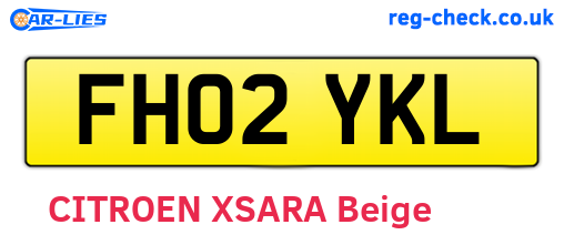 FH02YKL are the vehicle registration plates.