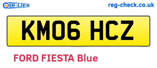 KM06HCZ are the vehicle registration plates.