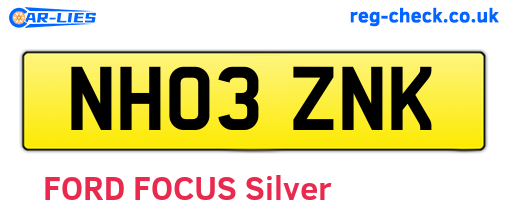 NH03ZNK are the vehicle registration plates.