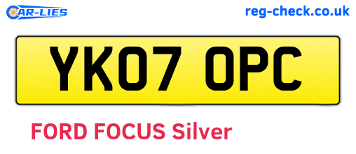 YK07OPC are the vehicle registration plates.