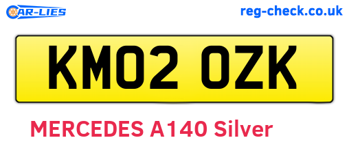 KM02OZK are the vehicle registration plates.