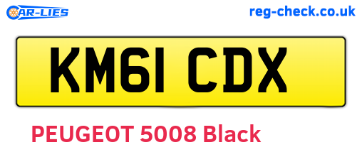 KM61CDX are the vehicle registration plates.