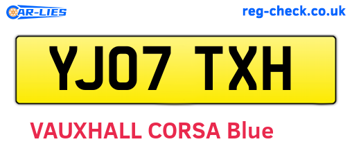 YJ07TXH are the vehicle registration plates.