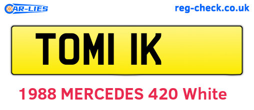 TOM11K are the vehicle registration plates.
