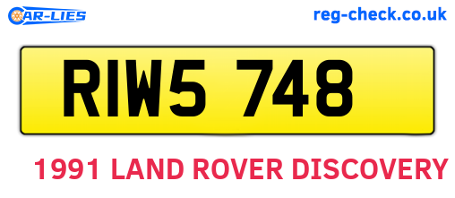 RIW5748 are the vehicle registration plates.