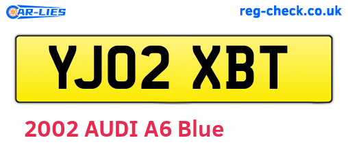 YJ02XBT are the vehicle registration plates.