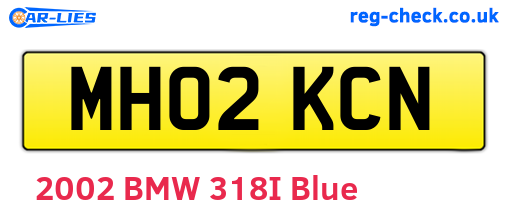MH02KCN are the vehicle registration plates.