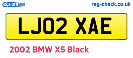 LJ02XAE are the vehicle registration plates.