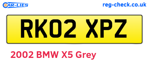 RK02XPZ are the vehicle registration plates.