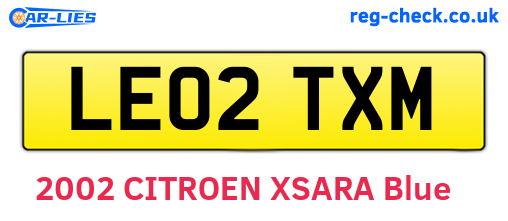 LE02TXM are the vehicle registration plates.