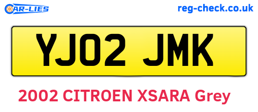 YJ02JMK are the vehicle registration plates.
