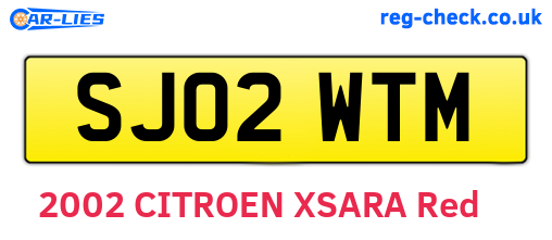SJ02WTM are the vehicle registration plates.