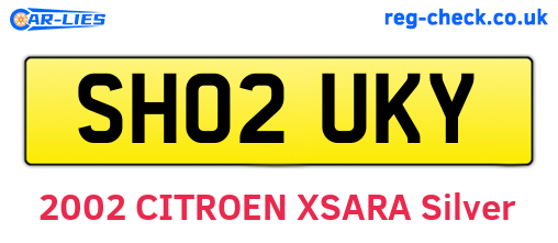 SH02UKY are the vehicle registration plates.