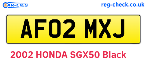 AF02MXJ are the vehicle registration plates.
