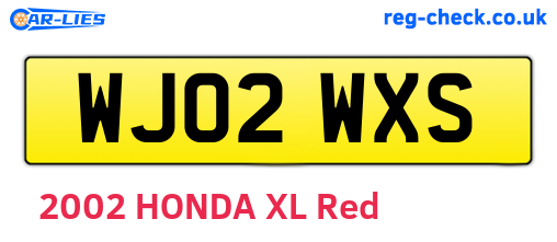 WJ02WXS are the vehicle registration plates.