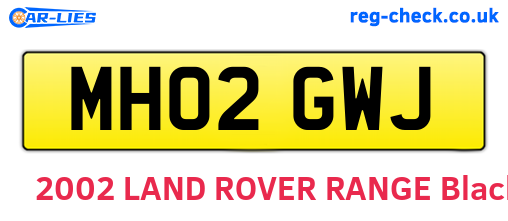 MH02GWJ are the vehicle registration plates.