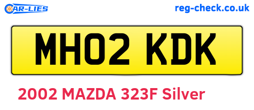 MH02KDK are the vehicle registration plates.