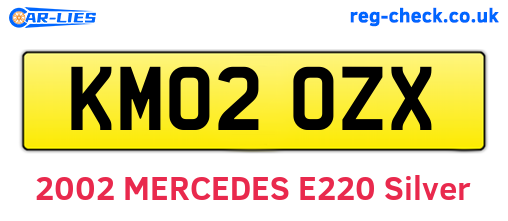 KM02OZX are the vehicle registration plates.