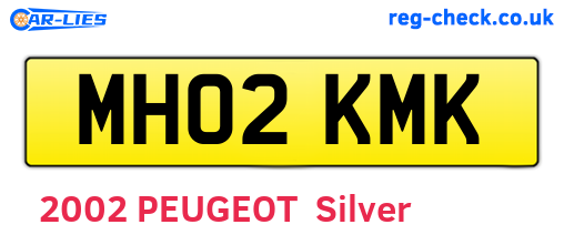 MH02KMK are the vehicle registration plates.
