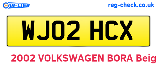 WJ02HCX are the vehicle registration plates.