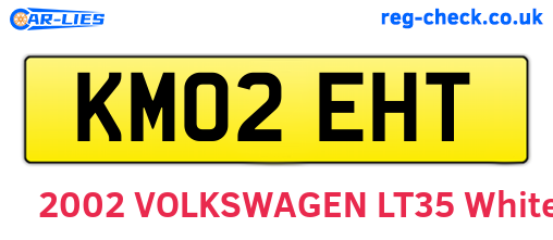KM02EHT are the vehicle registration plates.