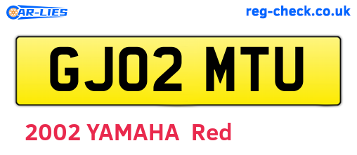 GJ02MTU are the vehicle registration plates.