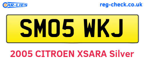 SM05WKJ are the vehicle registration plates.