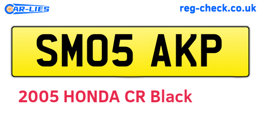 SM05AKP are the vehicle registration plates.