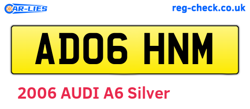 AD06HNM are the vehicle registration plates.