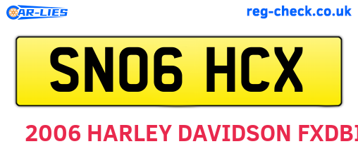 SN06HCX are the vehicle registration plates.