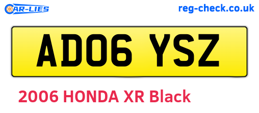 AD06YSZ are the vehicle registration plates.