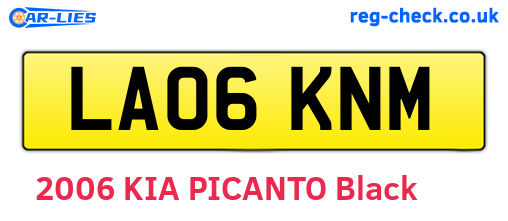 LA06KNM are the vehicle registration plates.