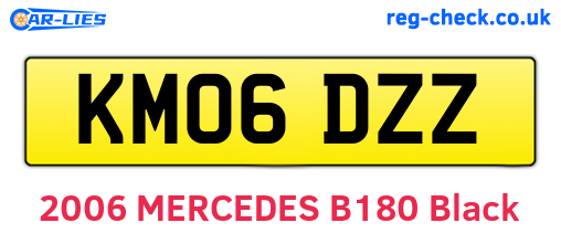 KM06DZZ are the vehicle registration plates.