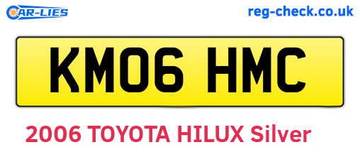 KM06HMC are the vehicle registration plates.