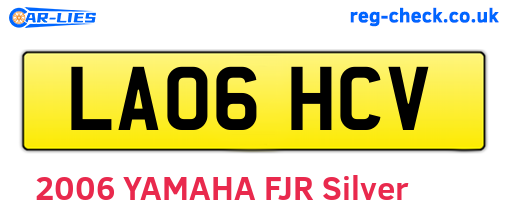 LA06HCV are the vehicle registration plates.