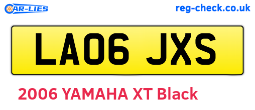LA06JXS are the vehicle registration plates.