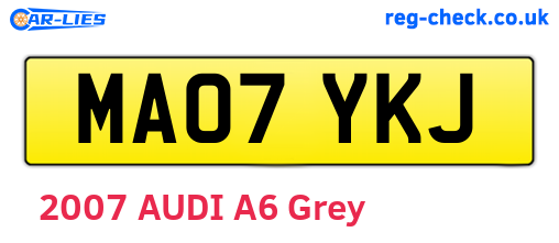 MA07YKJ are the vehicle registration plates.