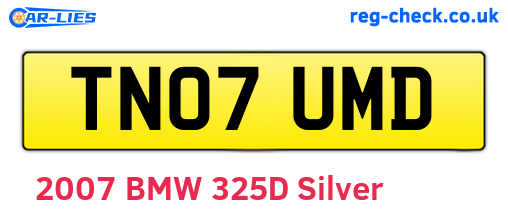 TN07UMD are the vehicle registration plates.