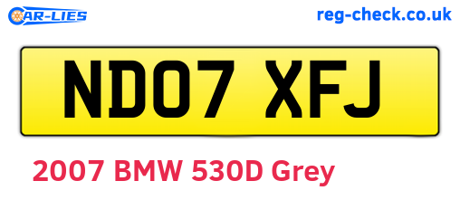 ND07XFJ are the vehicle registration plates.