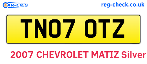TN07OTZ are the vehicle registration plates.