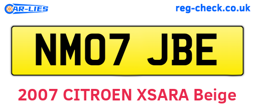 NM07JBE are the vehicle registration plates.