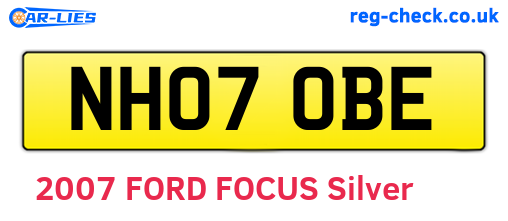 NH07OBE are the vehicle registration plates.
