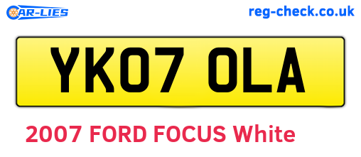 YK07OLA are the vehicle registration plates.