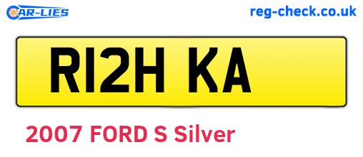 R12HKA are the vehicle registration plates.
