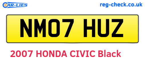 NM07HUZ are the vehicle registration plates.