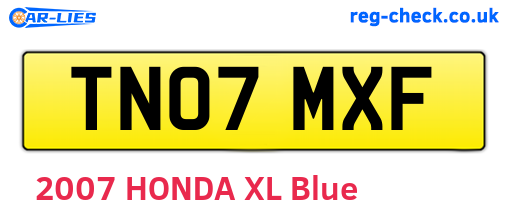 TN07MXF are the vehicle registration plates.