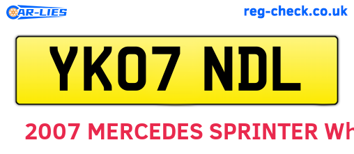 YK07NDL are the vehicle registration plates.