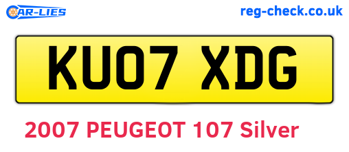 KU07XDG are the vehicle registration plates.